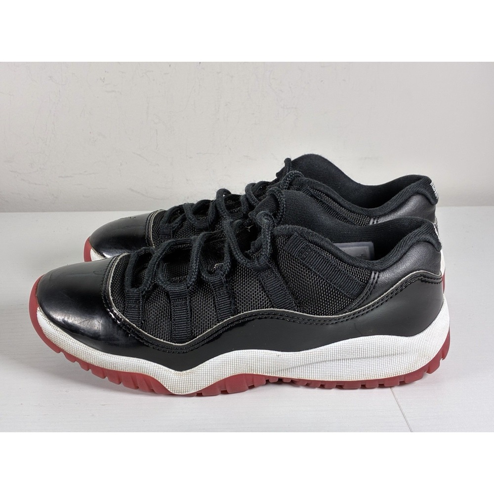 Air Jordan 11 Retro Low "Bred" 2Y Youth Basketball Shoes - Picture 3 of 9